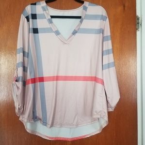Woman's burberry pattern shirt